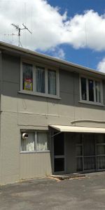 This tidy downstairs unit offers one living area, one bedroom and a bathroom with the laundry included. - Photo 4