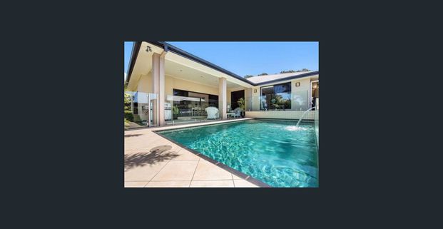 Spacious family home in Coomera Waters! - Photo 1