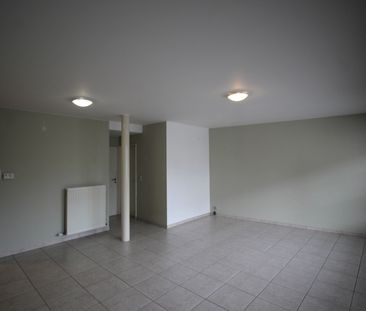 Een gezellig appartement op benedenverdieping vooraan - met garage - Photo 1