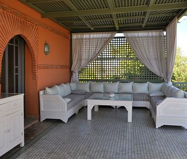 Maison au coeur d'un jardin luxuriant dans la Palmeraie de Marrakech - Photo 1