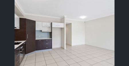 Suave Villa-Style Townhouse - Photo 5