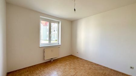 Helle Erdgeschosswohnung mit charmanter Freifläche - Foto 4