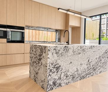 Brand-New Luxury Home with Solar Battery & Premium Miele Appliances - Photo 6