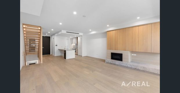 Experience Contemporary Luxury and Elegance in a Near-New Three-Bedroom Residence! - Photo 1