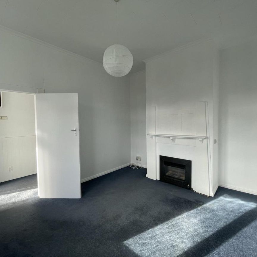 Centrally located three-bedroom home - Photo 1