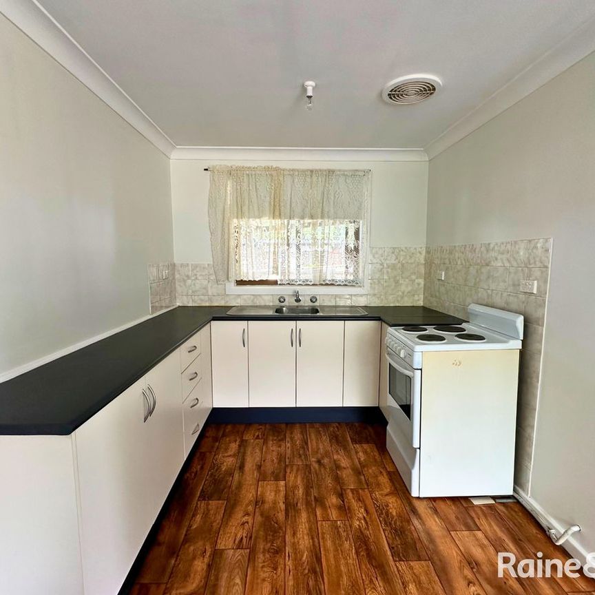 Comfortable & Low Maintenance Living Close to Everything - Photo 1