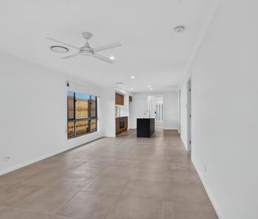 Brand New 4-Bedroom Home | Ducted Air, Solar & Multiple Living Areas - Photo 1