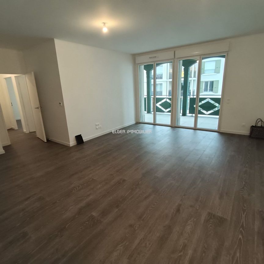 Location - appartement - 65.01 m² - 3 Pièces - Photo 1