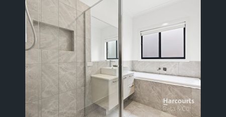 Spacious 4-Bedroom Home with Modern Features in Wollert - Photo 5