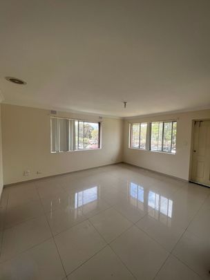Luxury Living in Merrylands: Rent a Stunning Apartment at 4/22 Military Road - Photo 1