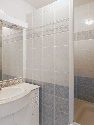 Appartement à louer - BOULEVARD CARTERET - Photo 5