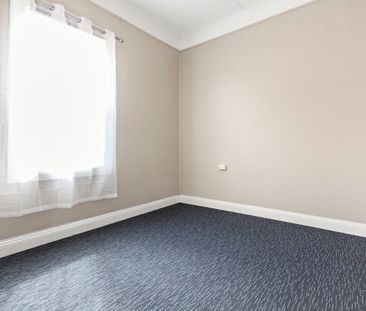 Character filled home on a level sunny block - Photo 6