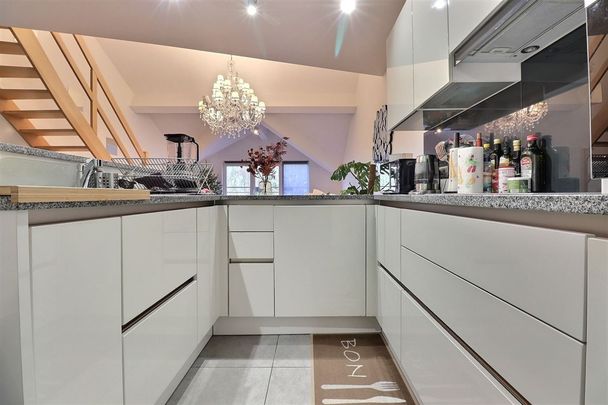 Appartement type duplex (B27) de +/- 100 m2 avec 2 chambres + garage fermé (21) - Photo 1