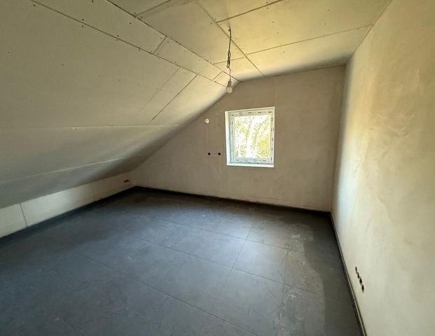 Neubau Dachgeschosswohnung in Drebber - Foto 1