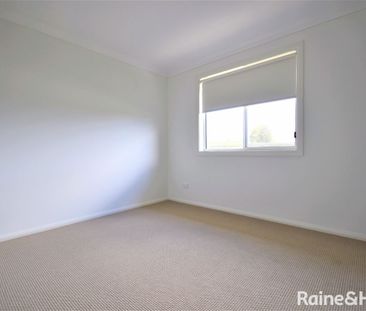 Stylish 4-Bedroom Home Designed for Comfort & Convenience - Photo 5