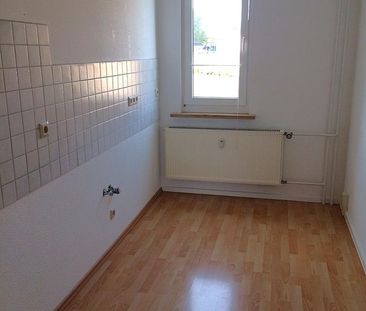 3-Raum-Wohnung mit Balkon im 2.Obergeschoss sowie Kfz-Stellplatz fü... - Foto 3