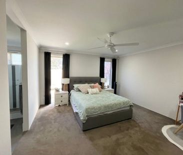 Spacious Family Home with Multiple Living Areas! - Photo 5