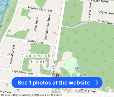 Four-Bedroom Home with Private Gardens & Multiple Living Areas - Photo 1