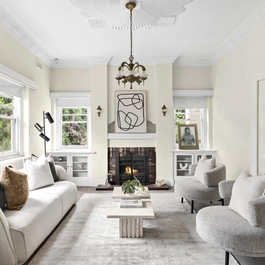 Family-Sized Art Deco Classic on a Prime Corner offering Comfort & Character - Photo 1