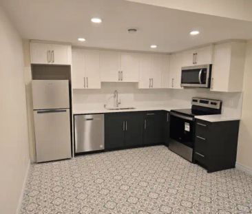 RENT a bright and modern 2-bedroom, 1bath legal basement suite. | C... - Photo 1