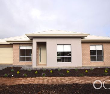 Open the Door To Stylish Easy-Care Living in Hillcrest - Photo 1