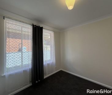 Updated and bright family home near James Shean Catholic High School - Photo 4