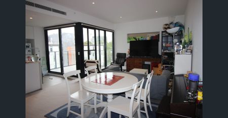 Conveniently Located Mid Level Modern Apartment with Pleasant Views & Complex Facilities - Photo 5