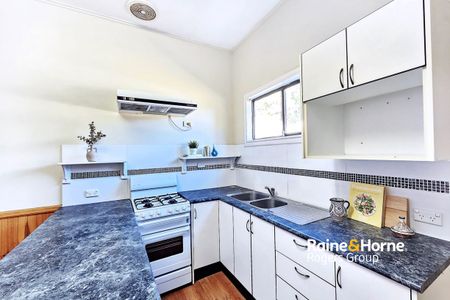 Charming Cottage & Great Location - Photo 5