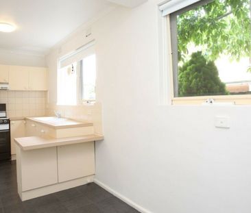 SECURE ONE-BEDROOM APARTMENT WITH PRIVATE COURTYARD & PARKING! - Photo 5