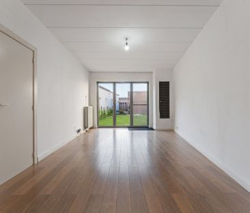 Gelijkvloers appartement met 1 à 2 slaapkamers, tuintje en garagebox - Photo 1