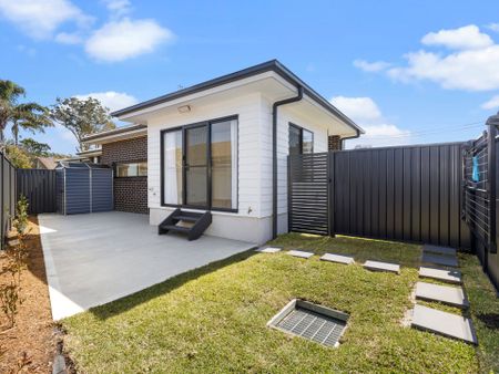 Stylish Near-New 2-Bedroom Home with Spacious Outdoor Living - Photo 3