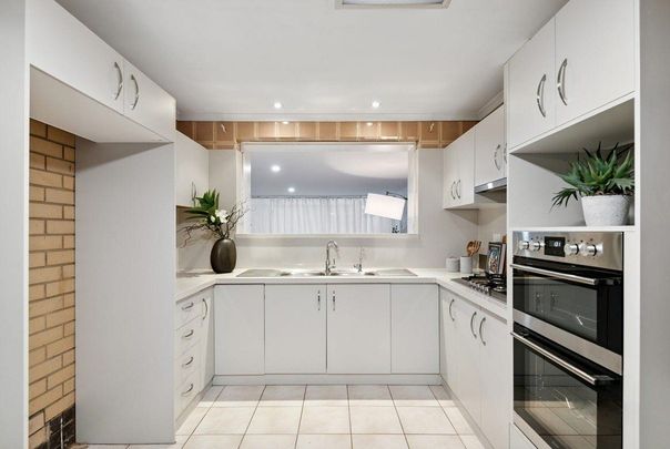 Stylish, Spacious Basket Range Stone Home in the Heart of Glynde! - Photo 1