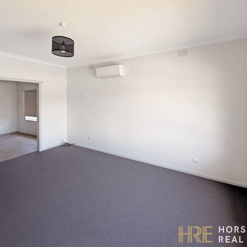 Modern Three-Bedroom Home Close to the CBD - Photo 1