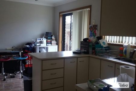 Charming 3 Bedroom Brick Home with Double Garage - Photo 4