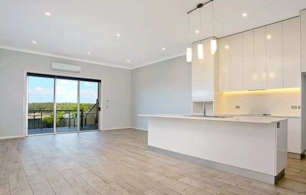 Comfortable 4-Bedroom House in Schofields - Photo 1