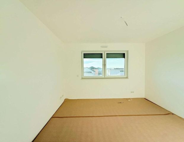 Helle 3-Zimmer-Neubauwohnung mit Balkon in Fernwald-Annerod! - Foto 1