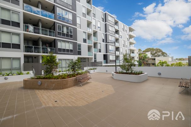 Entry via Block B,1-bed + study modern apartment now for lease - Photo 1