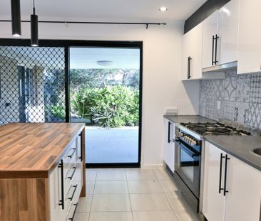 MODERN COASTAL LIVING WITH STYLISH INTERIORS, SHED & SPACIOUS ENTER... - Photo 6