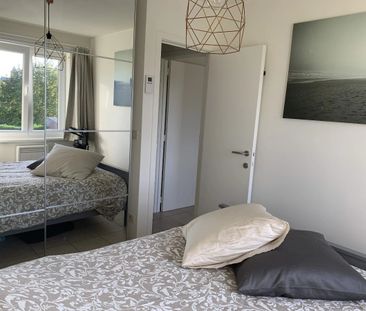 Gerenoveerd bemeubeld 2-slpk appartement met staanplaats - Photo 4