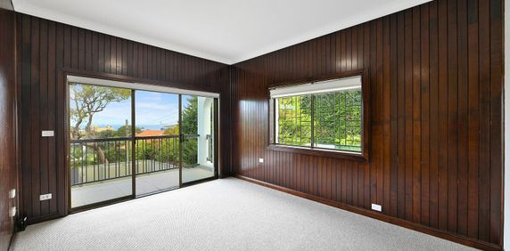 RENOVATED LOWER LEVEL DUPLEX WITH LOCK UP GARAGE - Photo 2