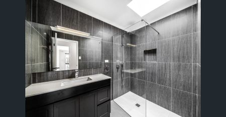 Spacious, Sunlit Home with Modern Upgrades & Leafy Outdoor Living - Photo 5