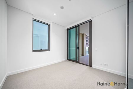 Near-New Luxury 2 Bedroom Apartment in the Heart of Rhodes Central - Photo 2