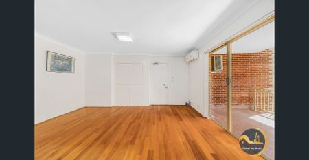 Charming and Spacious 3-bedroom Unit - Photo 2