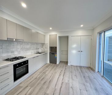 Modern 1 Bed Granny Flat in Popular Huntlee - Photo 3