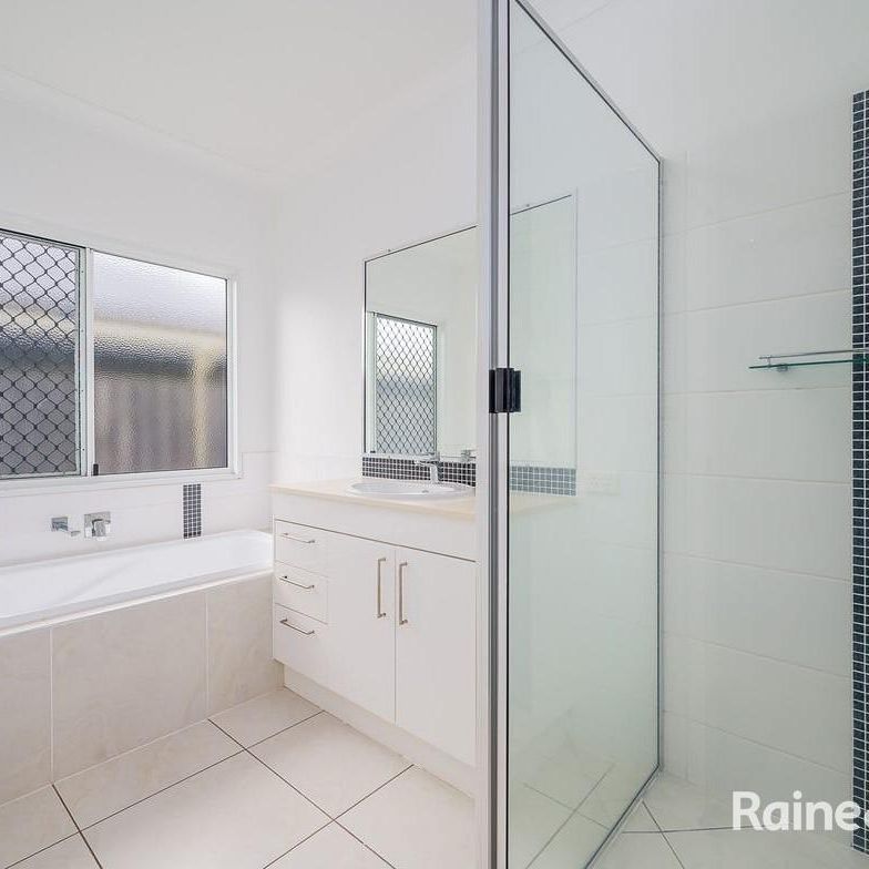 LOW SET FULLY AIR CONDITIONED THREE BEDROOM HOME IN CLINTON! - Photo 1
