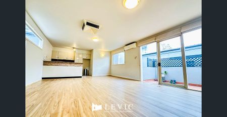 Exceptional Townhouse Living in a Prestigious Melbourne Locale - Photo 5