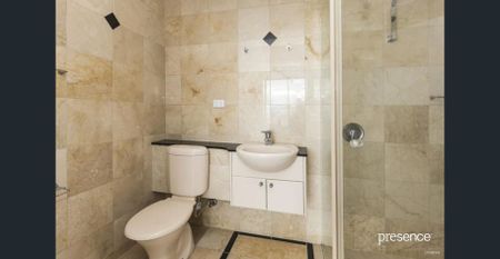 BEACHFRONT LIVING IN THIS SPACIOUS AND TIDY RESIDENCE - Photo 5