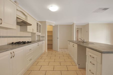 Fresh, Spacious Four Bedroom Home, and Ready to Impress! - Photo 3