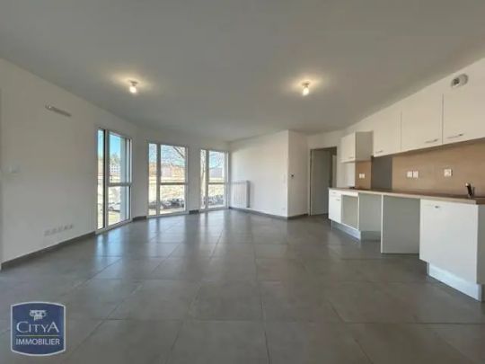 Appartement à louer 5 pièces 97.3m² - Photo 1