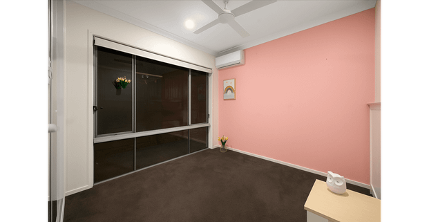 Four-Bedroom Family Home in a Peaceful Coomera Location - Photo 1